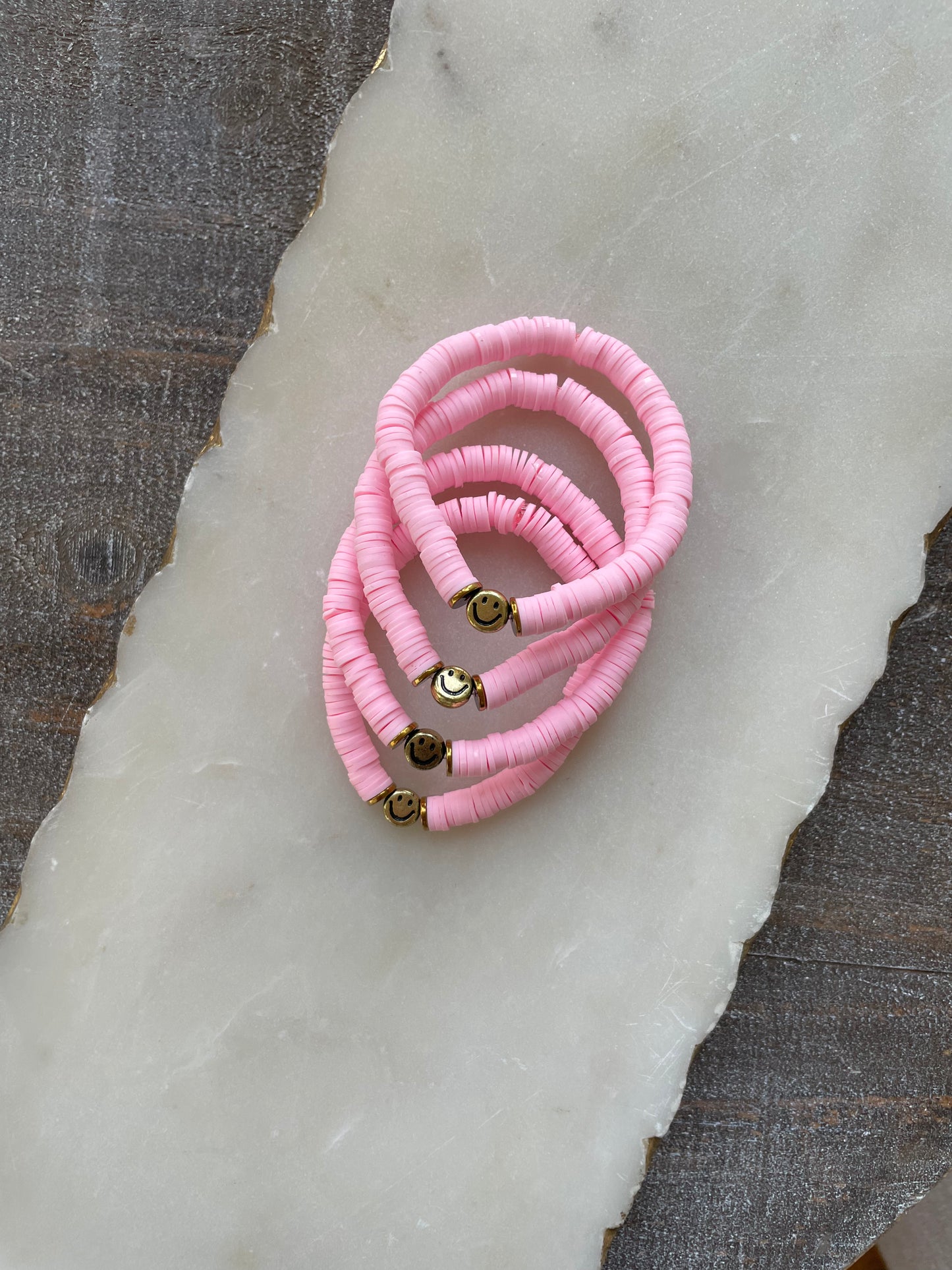 Pink smiley face kid bracelet