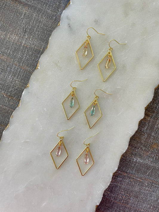 Gold earrings with small stone